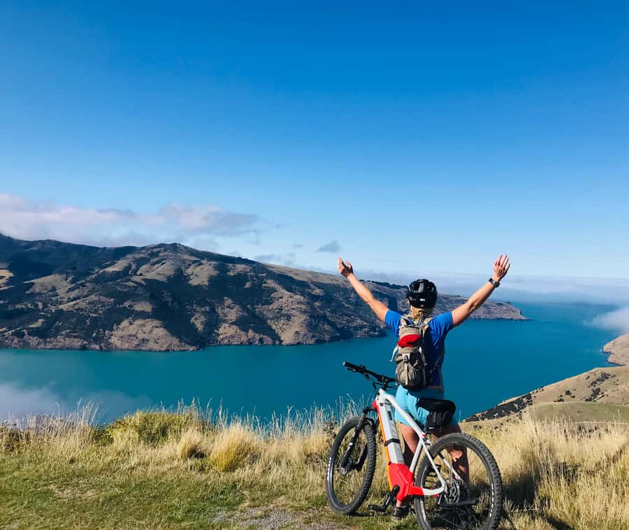 Akaroa: Guided Electric Mountain Bike Tour-Lava Loop - Setting off toward the crater rim
