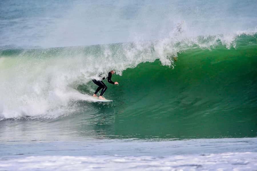 Auckland: Group Surfing Lesson with Muriwai Surf School - Two hours of coached practice in the surf