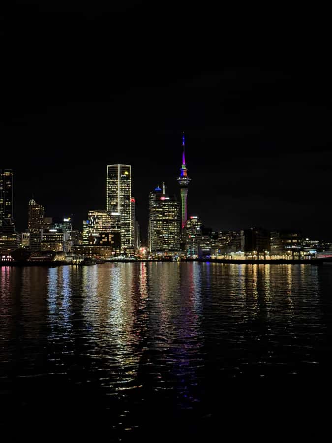 Auckland: Nightlights Harbour Cruise with Canapés and Drink - Watching the city change at sunset