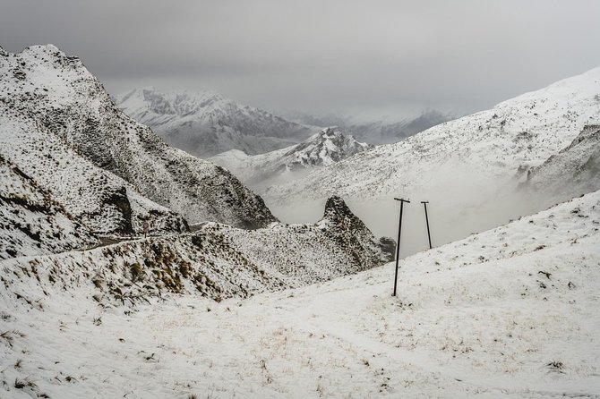 AuthenticAs Discover Queenstown - Professional Photography & Exclusive 4WD Tour - Lake Hayes: reflective water and mountain views
