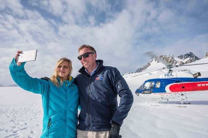 Fox Glacier: Neve Discoverer Helicopter Flight with Snow Landing - From rainforest to ice in minutes