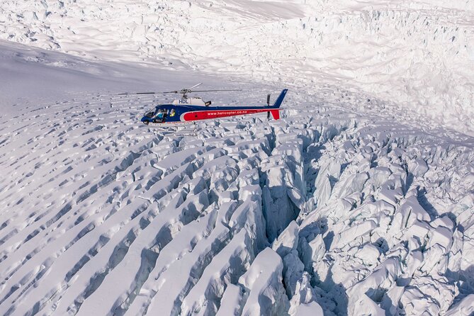 Fox Glacier: Neve Discoverer Helicopter Flight with Snow Landing - Landing on Fox Glacier’s snowfield