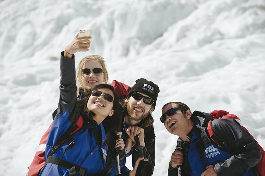 Fox Glacier: Up to 3 Hours Hike with Helicopter Transfer - Up to three hours among caves, arches, and icefalls