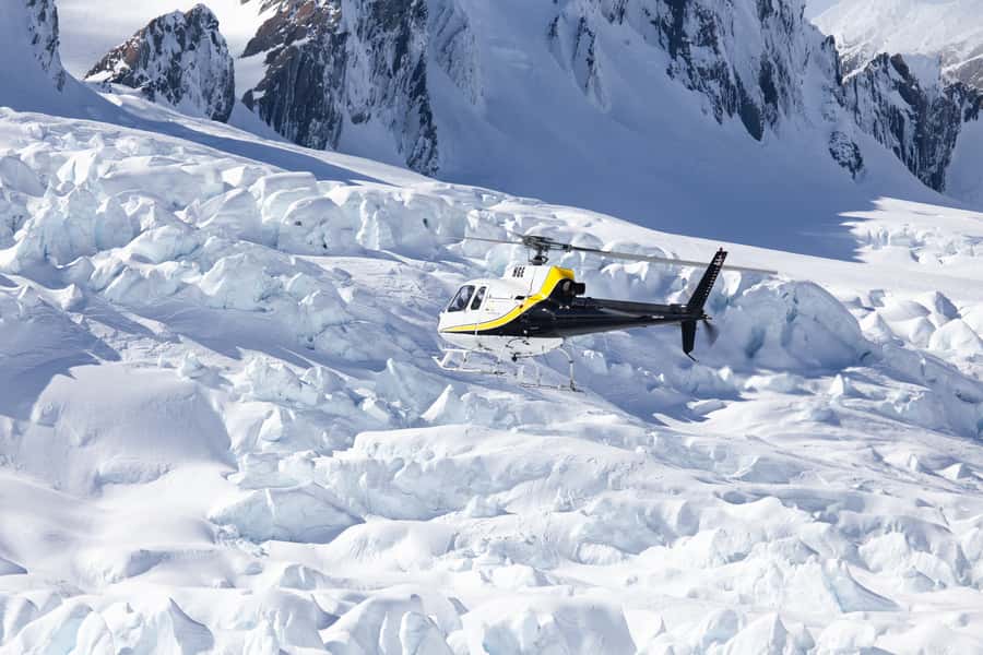 Franz Josef: Glacier Helicopter Ride with Snow Landing - Stepping Onto the Snow