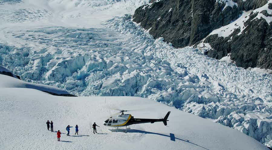 Franz Josef: Glacier Helicopter Ride with Snow Landing - The Return Over Rainforest and Ice