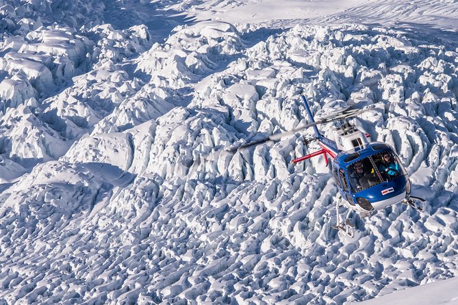 Franz Josef: Neve Discoverer Helicopter Flight with snow landing - Aoraki Mount Cook and Southern Alps views