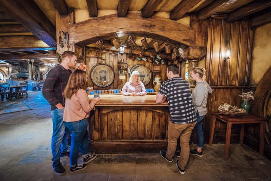 From Matamata: Guided Hobbiton Experience with Bus Transfers - The Mill, water, and the Green Dragon Inn