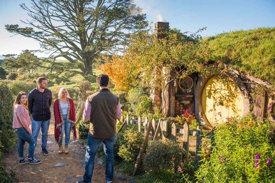 From Matamata: Guided Hobbiton Experience with Bus Transfers - Crossing the Waikato farmland