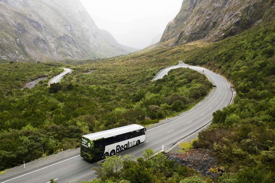 From Queenstown: Milford Sound Cruise and Coach Day Tour - Leaving Queenstown beside Lake Wakatipu