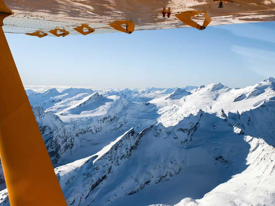 From Wanaka: Milford Sound Flight with Landing & Glaciers - Crossing into Fiordland’s rainforest country
