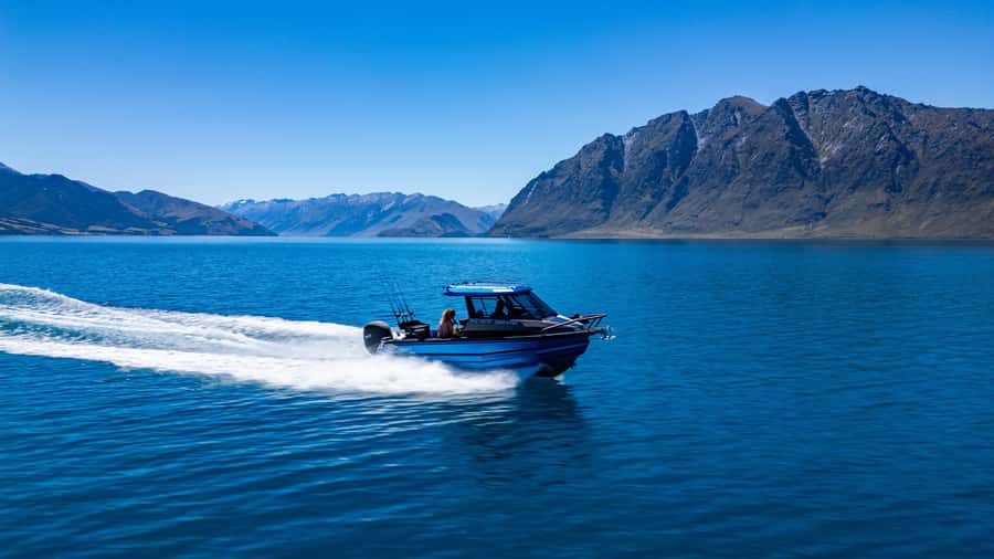 Lake Wakatipu: 3 Hour Fishing Adventure by Boat - Mountain views between the bites