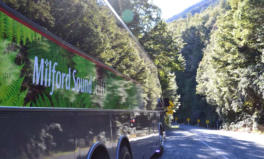 Milford Sound Premium Day Tour and Cruise from Te Anau - Leaving Te Anau in a glass-roof coach