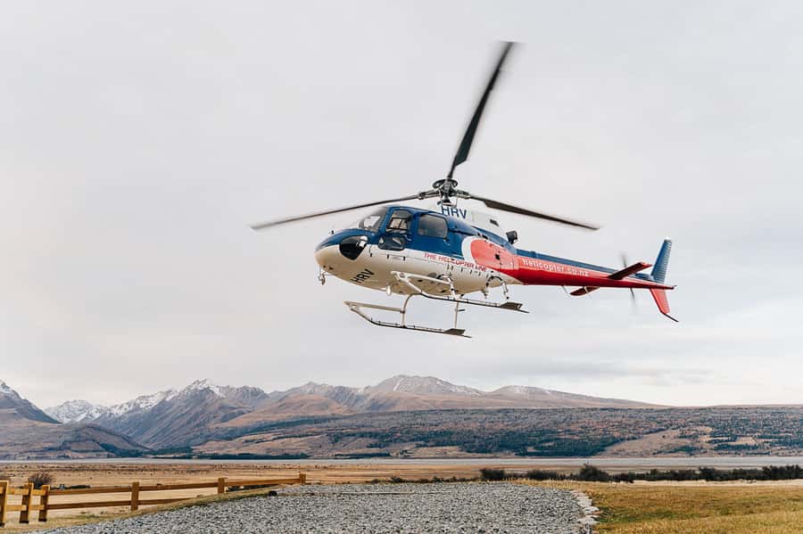Mount Cook: 25-Minute Alpine Vista Helicopter Flight - Taking off above Lake Pukaki