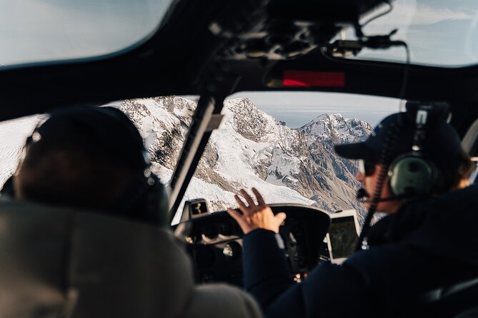 Mount Cook Alpine Explorer Helicopter Flight with Alpine Landing - Stepping onto the snowfield in Mount Cook National Park