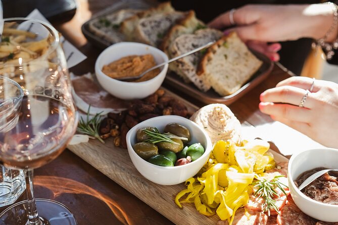 Queenstown: Afternoon Wine & Beer Tour with Platters - Stop two: five producers at Kinross Cellar Door