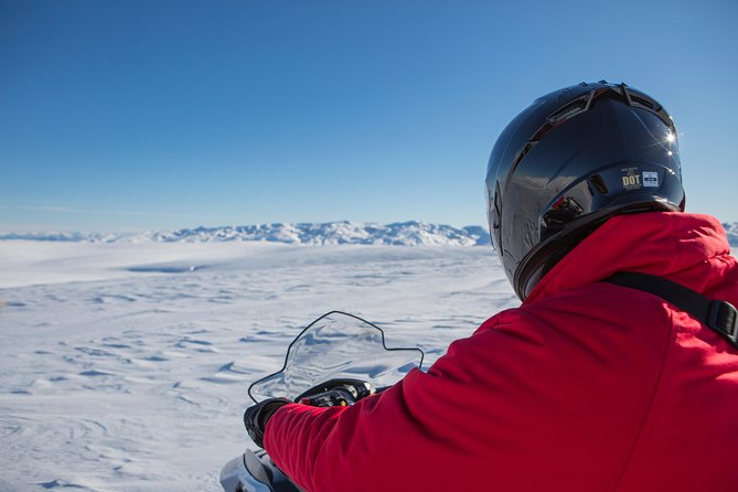 Queenstown Heli-Snowmobiling Adventure - Riding the Garvie Plateau by snowmobile