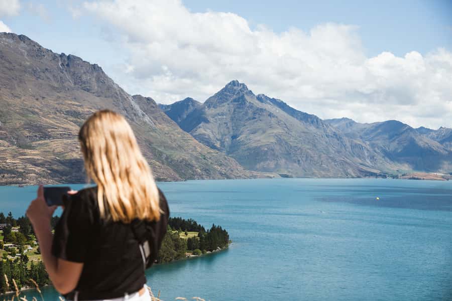 Queenstown: Scenic Highlights, Tour with Wine & Lake Cruise - Starting above Queenstown with wide lake views
