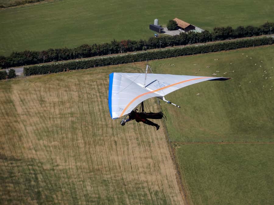 Queenstown: Tandem Hang Gliding Experience - Taking off from Coronet Peak
