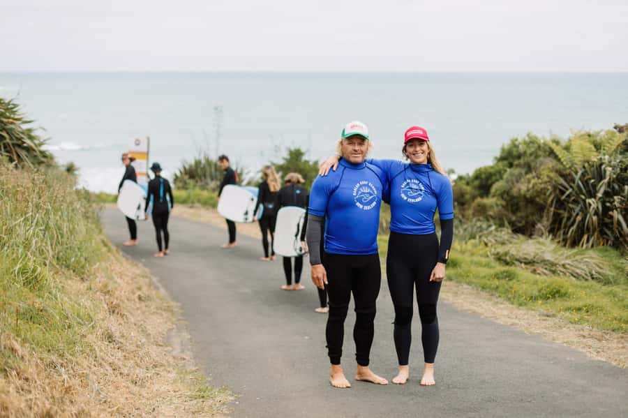 Raglan: Group Surf Lesson - Meeting the red truck at Ngarunui Beach