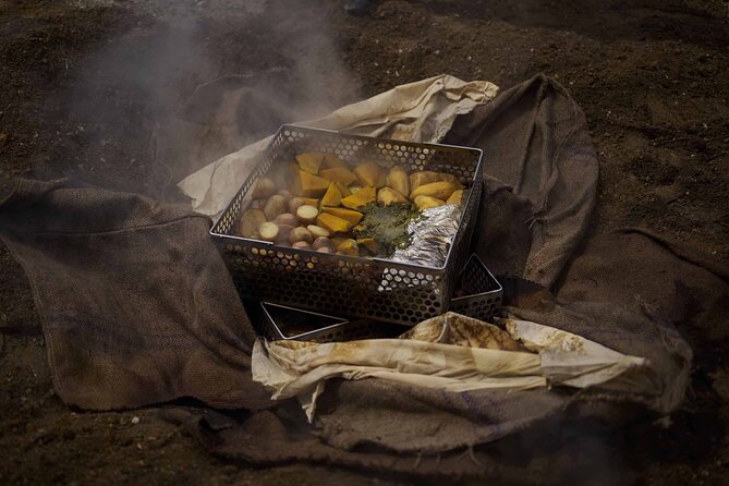 Te Puia: Te Pō Indigenous Evening Experience with Dinner - The hangi reveal begins the night
