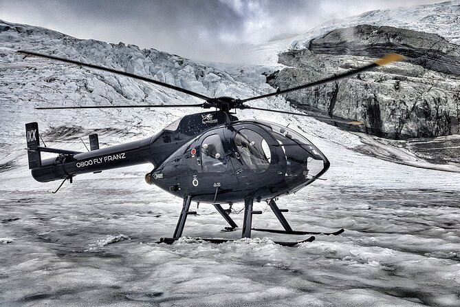 Twin Glacier Fox and Franz, Snow Landing (allow 30 mins - departing Fox Glacier) - Stepping onto the snowfield