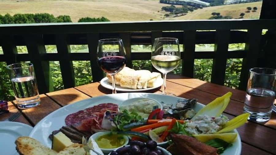 Waiheke: Scenic Taste and Graze Tour with Wine, Whisky, Beer - Mudbrick begins the day with Gulf views
