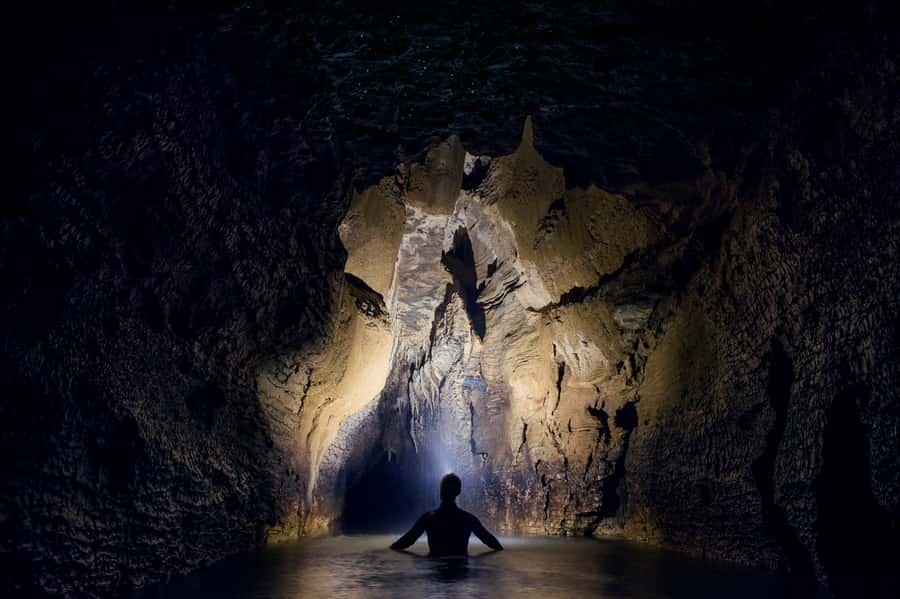 Waitomo Caves: Labyrinth Black Water Rafting Experience - Waterfalls, rushing water, and the Indiana Jones feeling