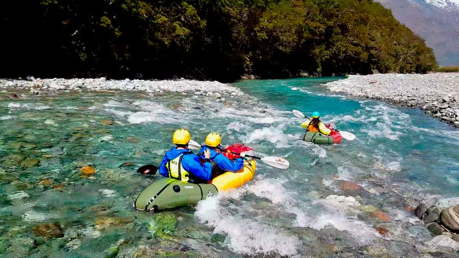 Wanaka: Full-Day Guided Packrafting Tour with Lunch - A short walk and a waterfall before the boats